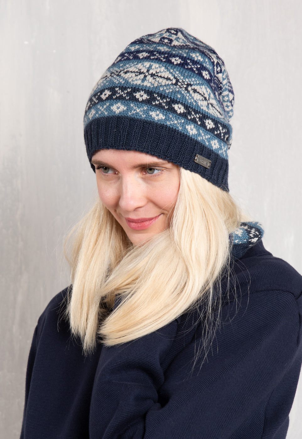Khara – gemusterte Longbeanie aus 100 % Wolle mit Bio-Baumwoll-Fleece Khara – gemusterte Longbeanie aus 100 % Wolle mit Bio-Baumwoll-Fleece