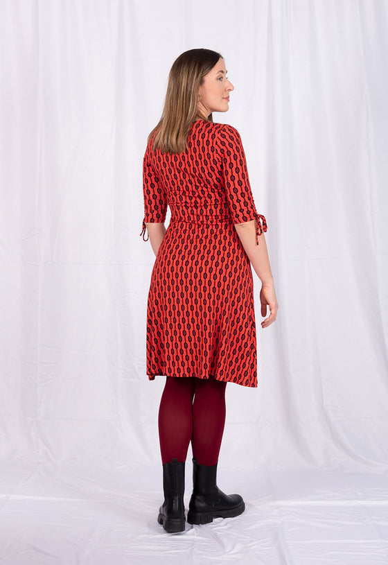 Kleid mit V-Ausschnitt, halblangen Ärmeln und Zierbändern - VD01W23